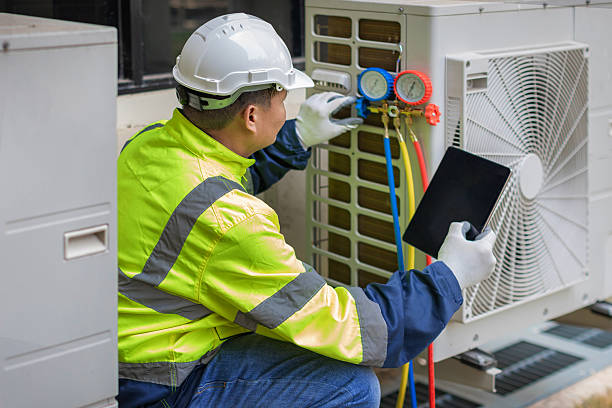Professional Ductwork Repair technician working in Parish, NY
